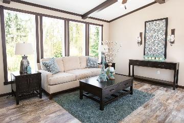 The Cozy Living Room of the Dewey Buccaneer Homes Manufactured Home from Worldwide Homes in Lumberton, Texas