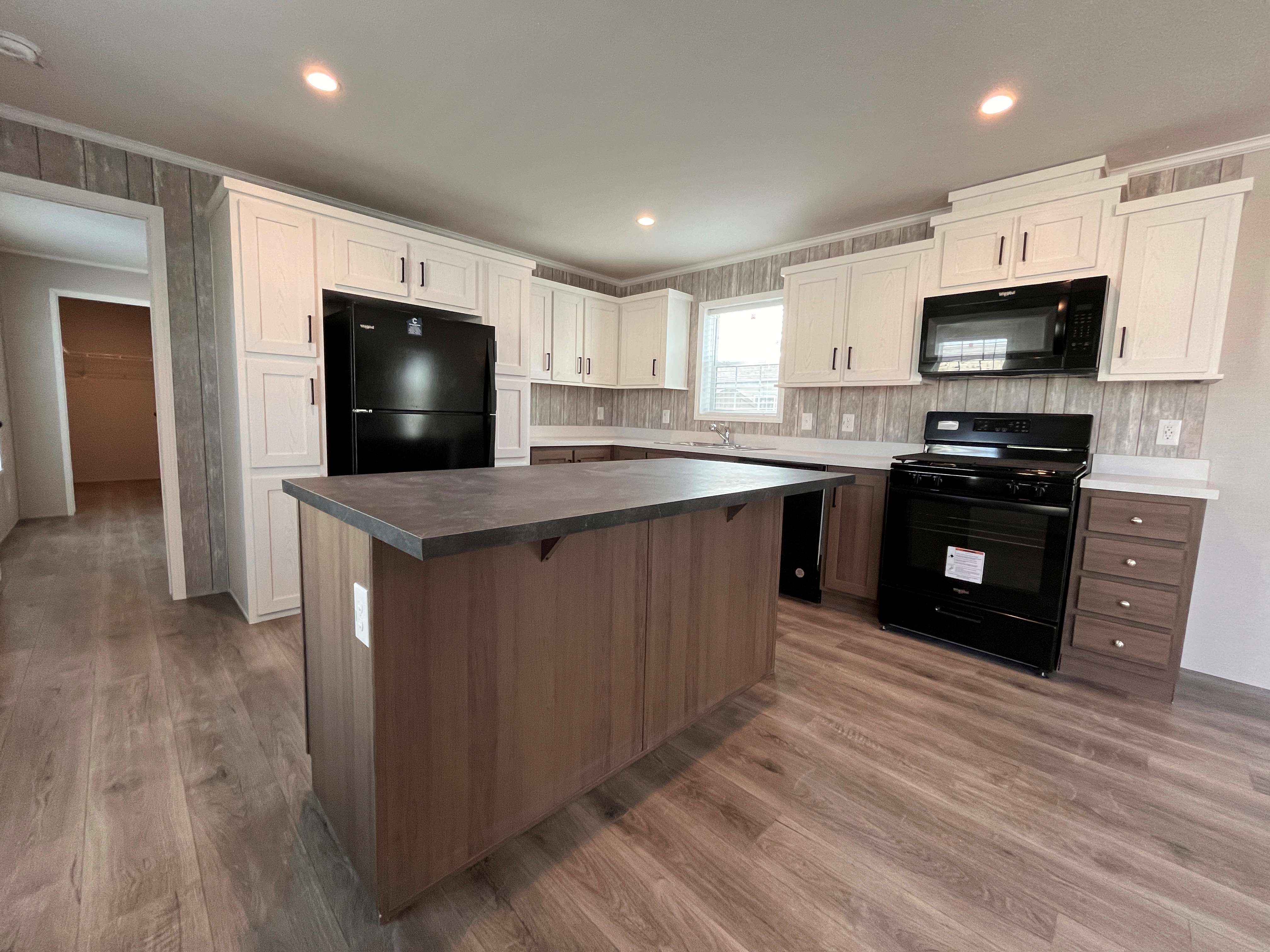 Beautiful kitchen with white cabinets and island